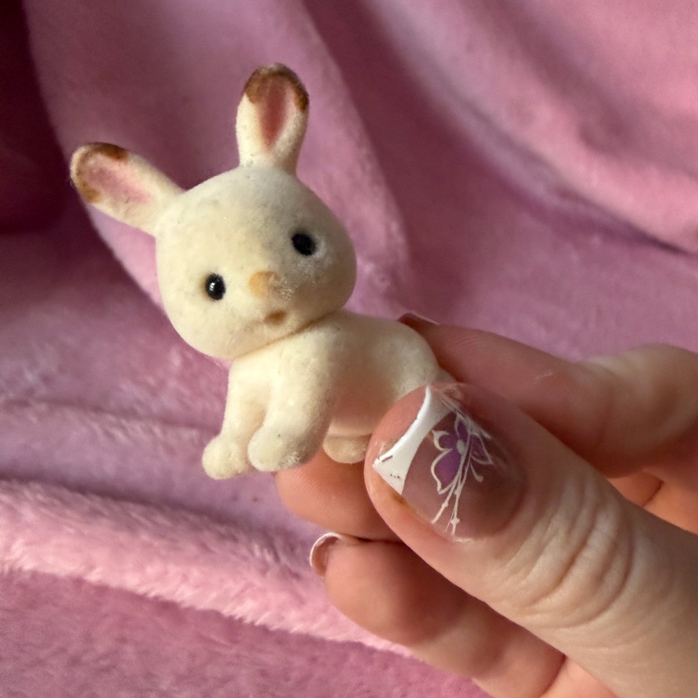 Baby crawling bunny calico critter